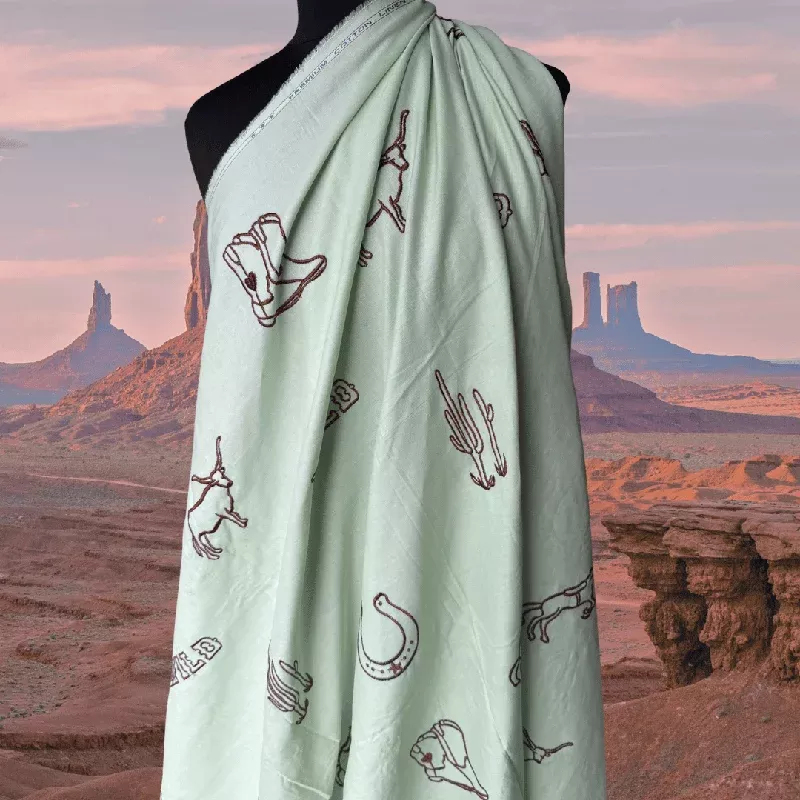 Damaged remnants – Wild West in Mint – Custom Embroidery on Linen Cotton