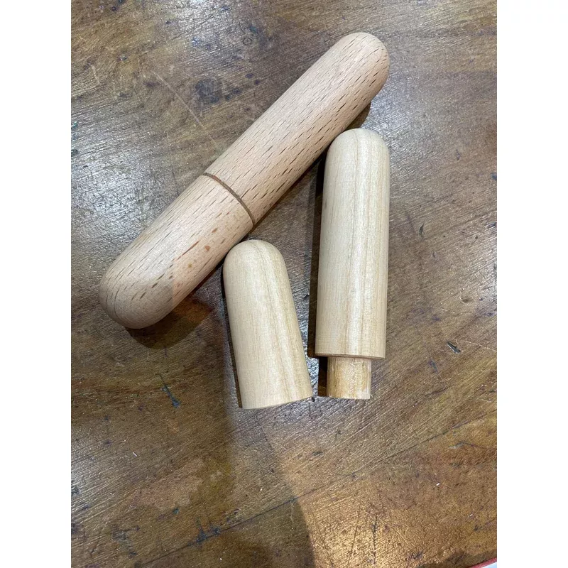 Hand turned wooden needle case.