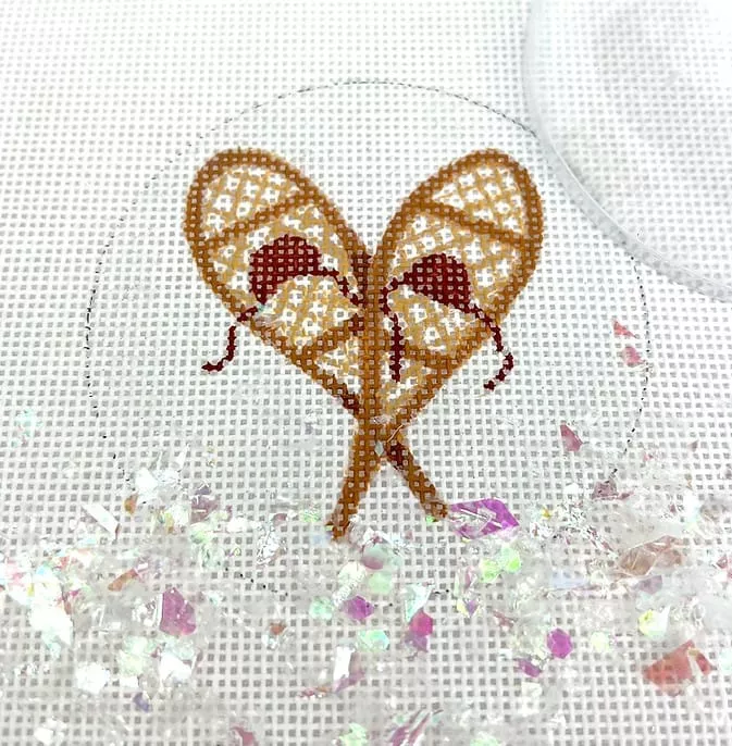 Kate Dickerson Needlepoint – 3″ Round w/Clear Dome & Confetti – Snowshoes