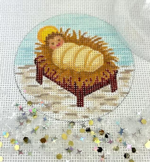 Kate Dickerson Needlepoint – Christmas Ornament w/Clear Dome & Confetti – Baby Jesus